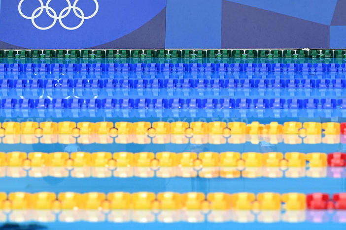 Empty lanes are pictured ahead of a heat for a swimming event during the Tokyo 2020 Olympic Games at the Tokyo Aquatics Center.