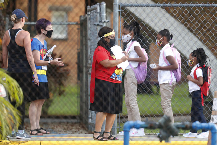 Students return to school at Seminole Heights Elementary in Tampa on Aug. 31, 2020, after the Florida Department of Education mandated in-class learning.