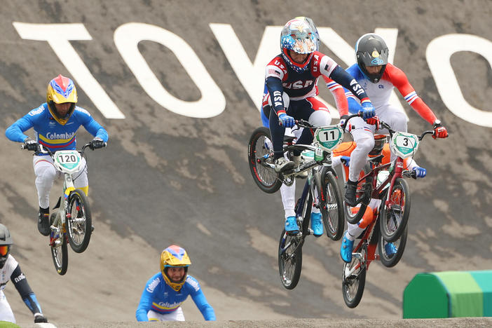 Connor Fields of Team USA leads other riders in the men's BMX semifinal on July 30 at the Tokyo Olympics. He would crash later, suffering a brain hemorrhage and broken rib.