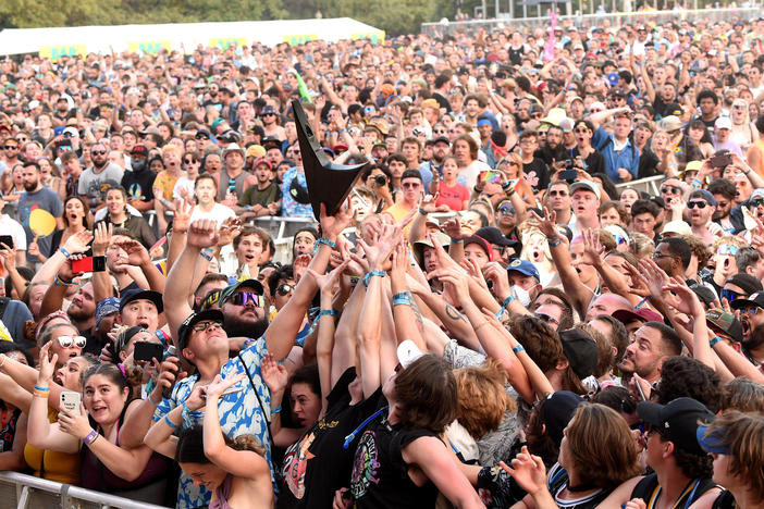 The crowd catches Wes Borland's guitar during the Lollapalooza music festival last weekend at Grant Park in Chicago.