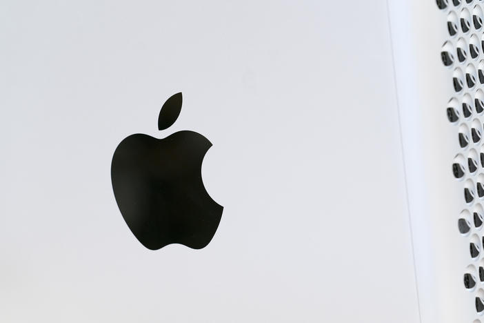 This May 21, 2021 photo shows the Apple logo displayed on a Mac Pro desktop computer in New York. Apple is planning to scan U.S. iPhones for images of child abuse, drawing applause from child protection groups but raising concern among security researchers that the system could be misused by governments looking to surveil their citizens.