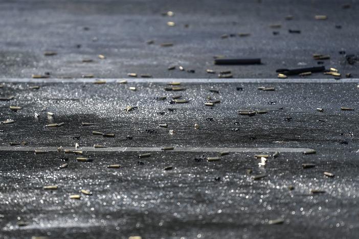 Bullet cases are seen on the ground at a crime scene after Mexico City's Public Security Secretary Omar García Harfuch was wounded in an attack, in Mexico City, on June 26, 2020.