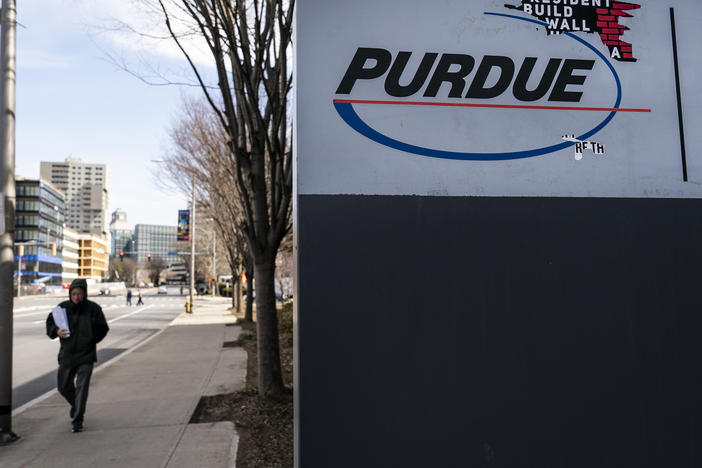 Signage for Purdue Pharma headquarters stands in downtown Stamford, April 2, 2019 in Stamford, Connecticut. Purdue Pharma, the maker of OxyContin, and its owners, the Sackler family, are facing hundreds of lawsuits across the country for the company's alleged role in the opioid epidemic that has killed more than 200,000 Americans over the past 20 years.