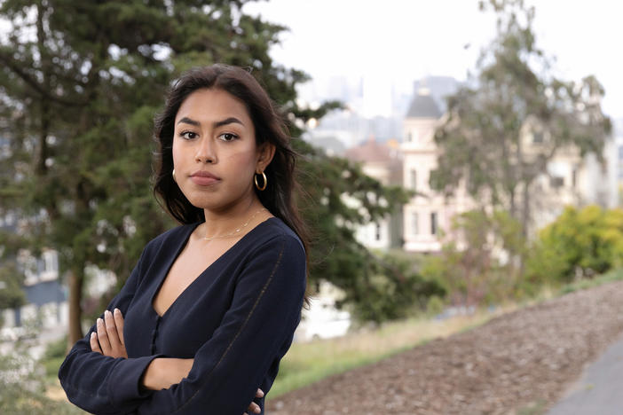 Tashrima Hossain, who used to work in Wall Street but quit to join Facebook, is part of a growing number of young people who are no longer attracted by the allure of Wall Street despite the rising salaries. She poses for a portrait at Alamo Square in San Francisco, Calif. on Wednesday, August 11, 2021.