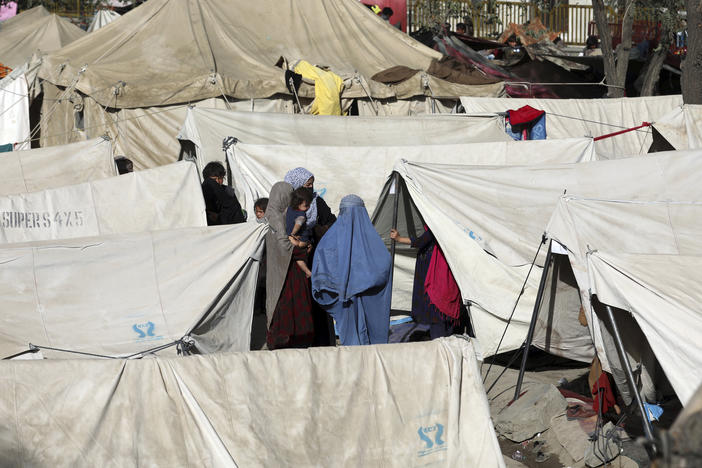 Internally displaced Afghans who have fled from northern provinces due to fighting between the Taliban and Afghan security personnel take refuge Friday in a park in Kabul.