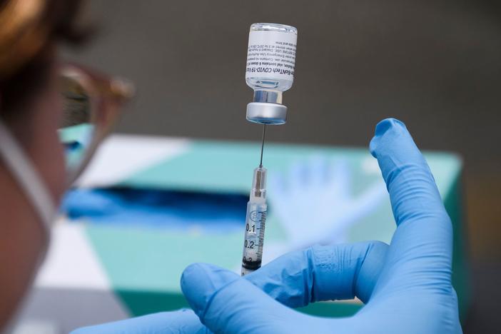 The CDC recommended that people with weakened immune systems get a third shot of either the Pfizer-BioNTech or Moderna vaccine. The move follows the FDA's authorization of such use a day earlier.