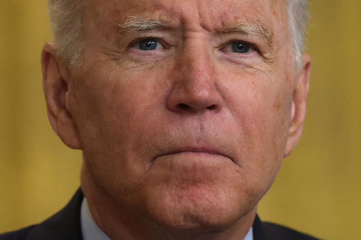 President Biden appears in the White House on July 8 to address the U.S. troop withdrawal from Afghanistan. He said the Taliban would not quickly overrun the country, though they have now made swift progress taking major cities.