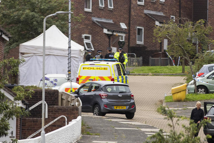 Police work the scene after a deadly shooting in Plymouth, England, on Thursday.