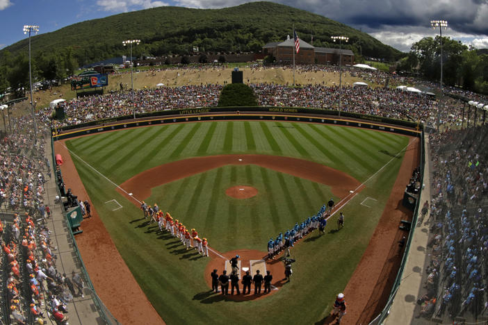 One year after the Little League World Series was canceled due to the COVID-19 pandemic, the upcoming series will be played without spectators from the general public. Here, players are seen on the field at Lamade Stadium in South Williamsport, Pa., during the tournament's 2019 edition.