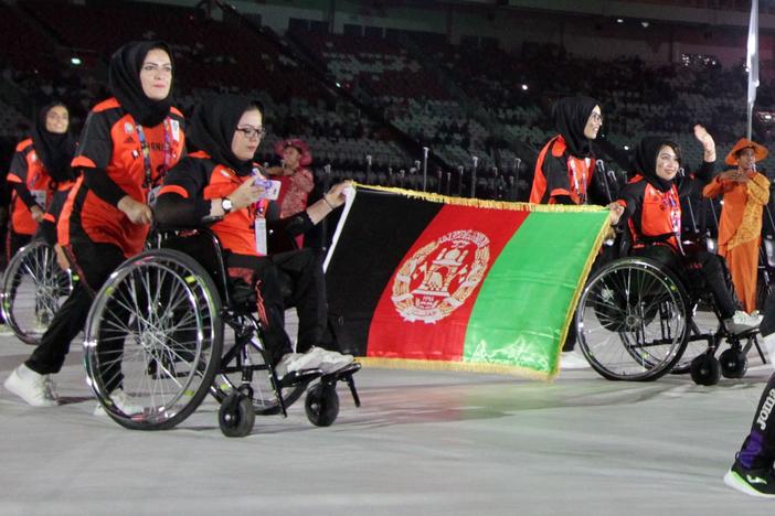 The Afghanistan Paralympic team won't compete in the Tokyo Paralympics, with commercial air travel halted due to the Taliban's sudden takeover. Here, the country's athletes are seen at the opening ceremony of the 2018 Asian Para Games at the Gelora Bung Karno main stadium in Jakarta.