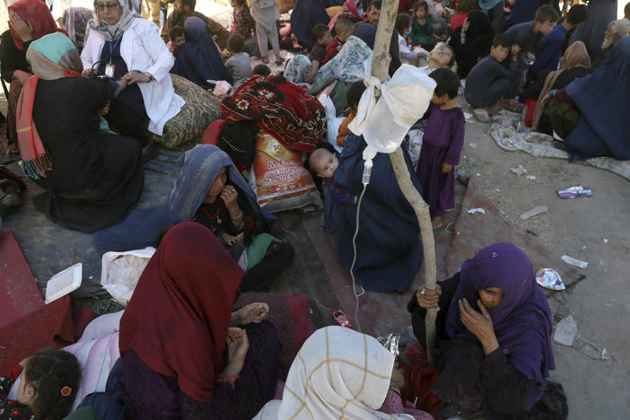 Internally displaced Afghan women from northern provinces, who fled their home due to fighting between the Taliban and Afghan security personnel, receive medical care in a public park in Kabul last Tuesday.