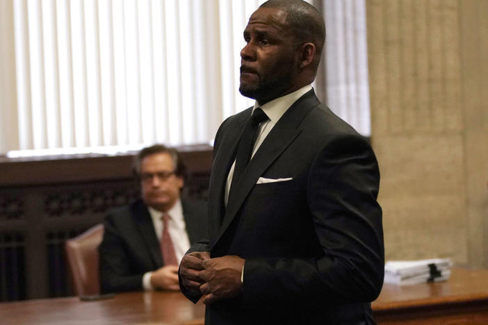 Singer R. Kelly appears in a Chicago courtroom in March 2019. The charges that R. Kelly faces in New York include racketeering "to prey upon young women and teenagers," and sexually trafficking these girls and women between states.