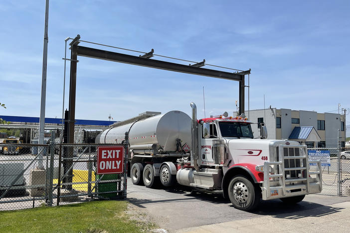 A driver exits the yard after filling up his gas tanker truck at Marathon Oil on May 20 in Salt Lake City.
