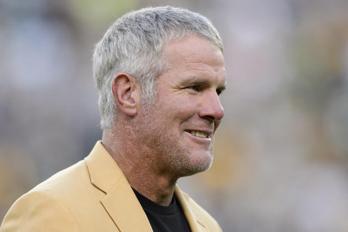 Former NFL quarterback Brett Favre looks on as he is inducted into the Ring of Honor during a halftime ceremony during the game between the Green Bay Packers and the Dallas Cowboys on Oct. 16, 2016.