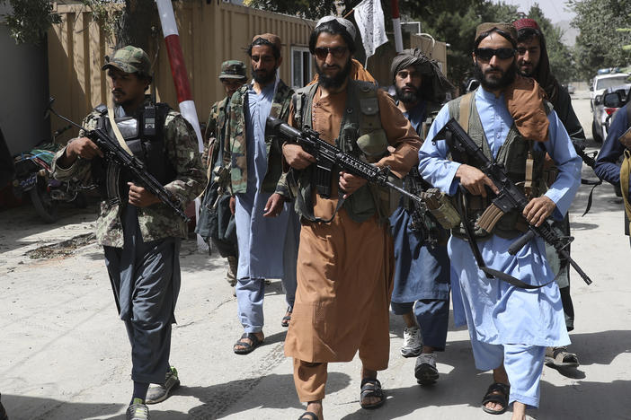 Taliban fighters patrol in the Wazir Akbar Khan neighborhood in the city of Kabul, Afghanistan, Wednesday, Aug. 18, 2021 as they seek to convince a wary population that they have changed.