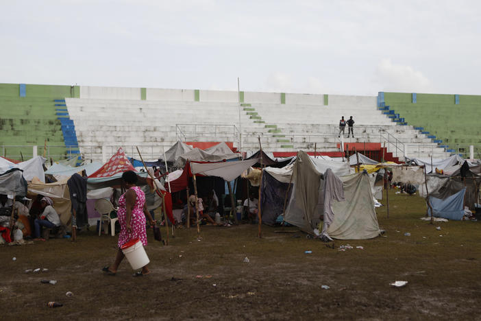 Hundreds of people are living in a makeshift tent city inside the main soccer stadium in Les Cayes, Haiti, following the  7.2 magnitude earthquake.
