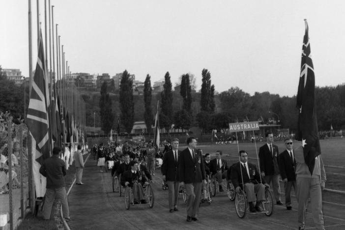 The Australian team parades around the Acqua Acetosa Ground in Rome on Sept. 18, 1960, during the opening ceremony for the Paralympic Games.
