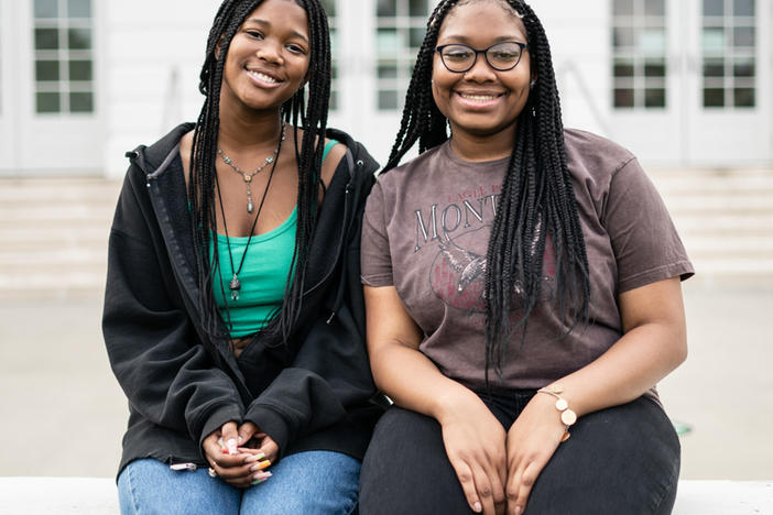 Makiyah Hicks and Jonetta Harrison in front of their high school, Duke Ellington School of the Arts, in Washington, D.C. They are finalists in this year's NPR Student Podcast Challenge for their entry "Loss and Transformation."