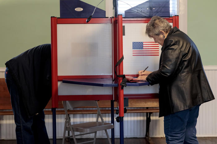 Voters cast their midterm ballots on Nov. 6, 2018, at Briles Schoolhouse in Peoria Township, Kan.