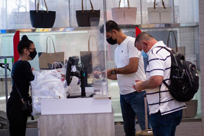 People shop at a Macy's in New York this month.