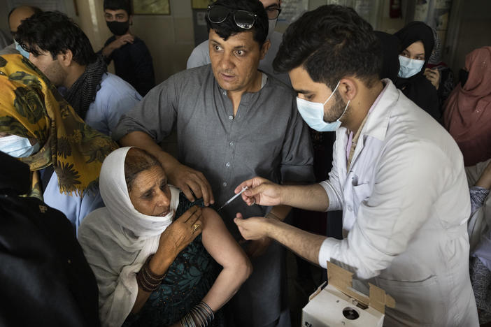 Doctors administer the Johnson & Johnson COVID-19 vaccine to patients at the Wazir Akbar Khan hospital in Kabul, Afghanistan in July.
