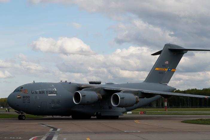 A U.S. Air Force C-17 Globemaster transport plane carrying medical supplies lands in Moscow in May 2020. The same type of plane airlifted refugees from Afghanistan this past week — one of whom gave birth on the aircraft.