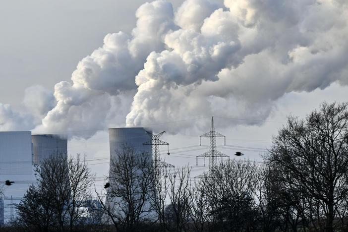 Steam blows from the RWE Niederaussem lignite-fired power station in Bergheim, Germany, in January 2020. Scientists from the National Oceanic and Atmospheric Administration say the concentration of greenhouse gases in 2020 was the highest on record.