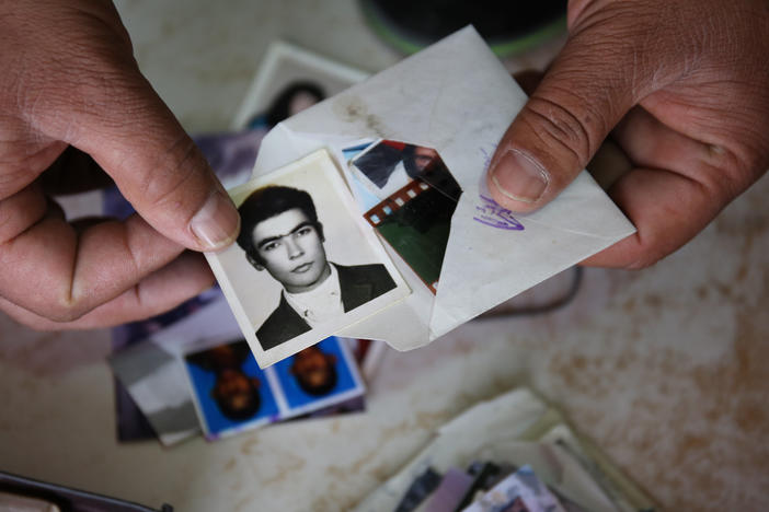 Uncollected or duplicate photographs found in boxes and drawers in backrooms of Kabul's photo studios.