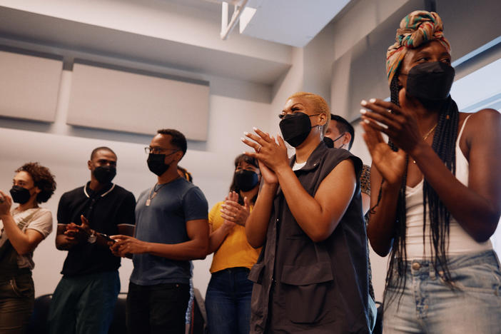 The cast of <em>Hadestown</em> gathered, masked, for their first rehearsal in 17 months. Broadway has strict safety protocols but there has been at least one breakthrough infection in a touring cast.