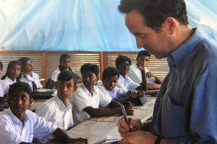 Joel Charny, who's been a humanitarian aid worker for 40 years, talks to students at a camp for internally displaced people in northern Sri Lanka in 2005. It's one of his favorite photos, he says, "because this is what I did hundreds of times: interview people about what they were going through and what they needed for their lives to improve."