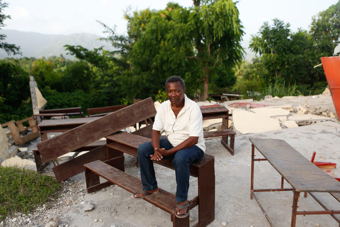 The Rev. Calixte Dorval in the remains of the Mission Evangélique Baptiste du Sud d'Haiti Picot in Marceline, Haiti, which was destroyed in the 7.2 magnitude earthquake.