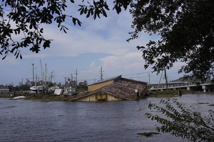 Flood damaged buildings and boats in the aftermath of Hurricane Ida, on Wednesday in Lafitte, La.