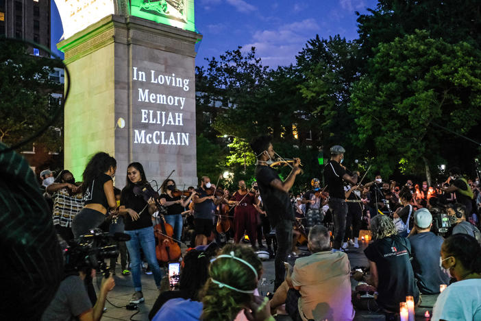 String players perform during a violin vigil for Elijah McClain in Washington Square Park on June 29, 2020, in New York City.