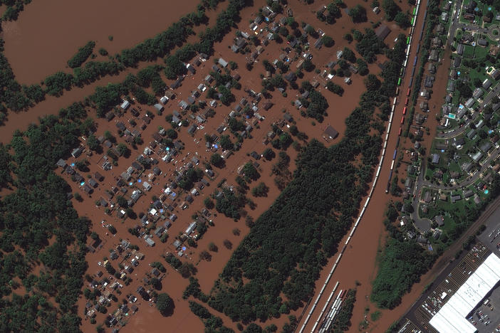 <strong>DURING FLOOD - Sept. 2, 2021:</strong> Overview of flooded homes along Huff Avenue and Railyard in Manville, N.J.