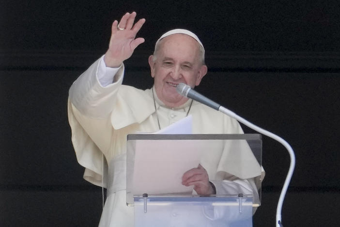 Pope Francis delivers his blessing as he recites the Angelus noon prayer from the window of his studio overlooking St.Peter's Square, at the Vatican, Sunday, Sept. 5, 2021.