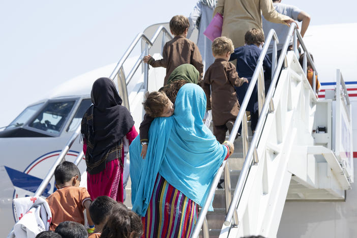 A group of vulnerable Afghans board a domestic United Airlines flight out of Dulles International airport on Aug. 26, 2021. Photo courtesy of United Airlines.