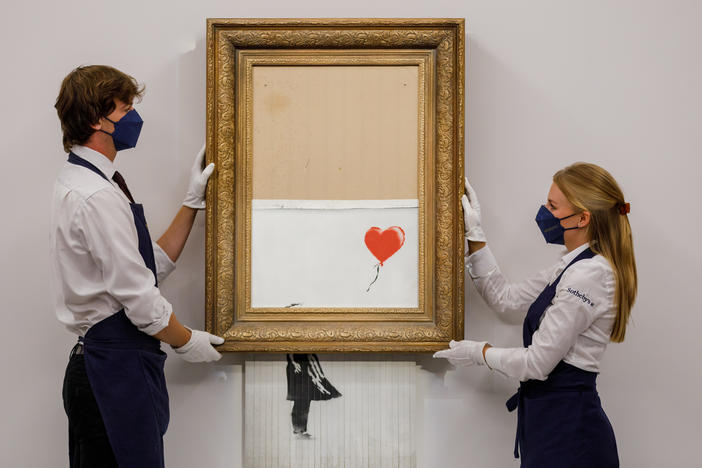 Banksy's "Love is in the Bin" is installed at Sotheby's on September 03, 2021 in London, England.