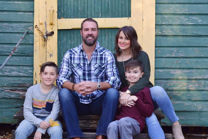 Brittany Schwaigert with her husband, Ryan, 13-year-old Greyson (far right) and 10-year-old Lachlan. Schwaigert is a lead plaintiff in a class action lawsuit challenging the Tennessee governor's opt-out policy on masks.