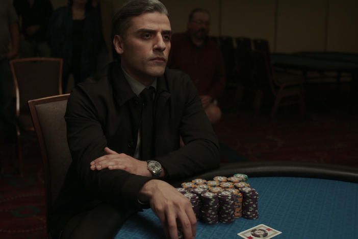 Oscar Isaac plays a former military interrogator who is haunted by the past in Paul Schrader's <em>The Card Counter.</em>