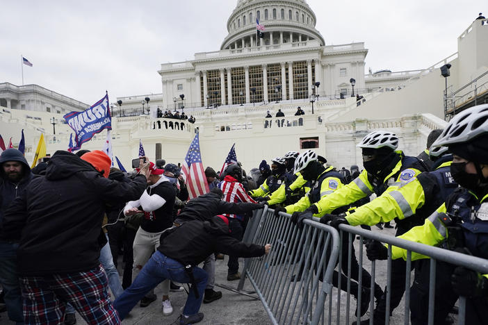 Trump supporters try to break through a police barrier Jan. 6 at the U.S. Capitol in Washington, D.C.