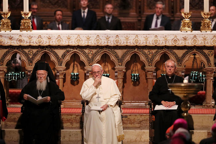 Pope Francis, Archbishop of Canterbury Justin Portal Welby and Archbishop of Constantinople and Ecumenical Patriarch Bartholomew, shown at a meeting of prayer in the Basilica of St. Francis in 2016, are asking for climate action.