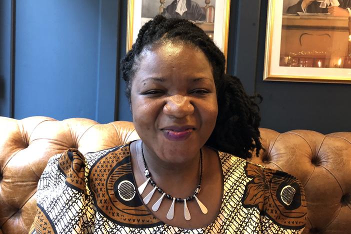 Angeline Murimirwa, executive director of the girls' education group CAMFED in Africa, at a pub in Oxford, England, in 2018. In August, CAMFED was awarded the $2.5 million 2021 Hilton Humanitarian Prize.