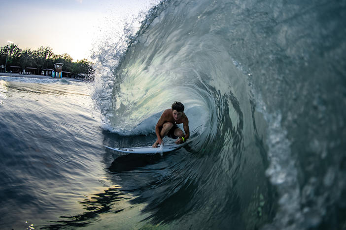 Ben Elliott gets barreled at the BSR Surf Resort, where artificial waves are attracting world-class talent.
