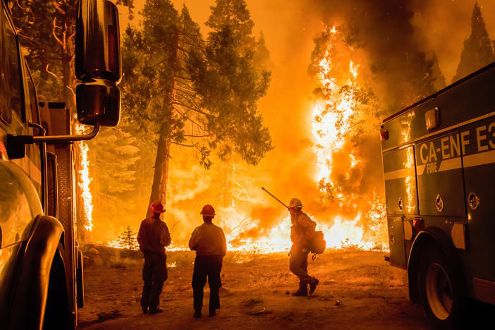 Crews set a backfire in an effort to gain control of the massive Caldor fire near the Tahoe basin in California on Aug. 26.