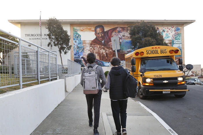 Students head toward Thurgood Marshall Academic High School in San Francisco in March.