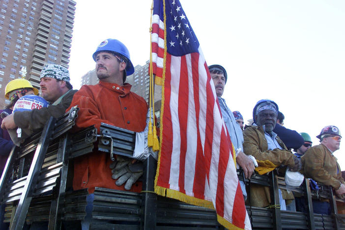 Recovery workers head to ground zero in New York City after the Sept. 11, 2001, attacks.