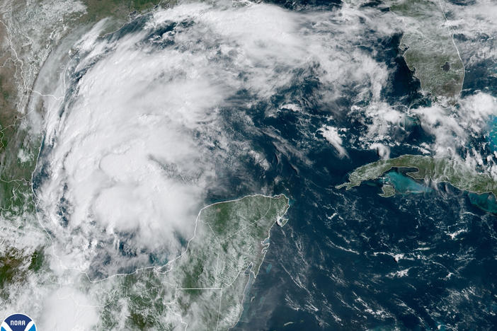 This satellite image provided by NOAA shows Tropical Storm Nicholas in the Gulf of Mexico on Sunday.