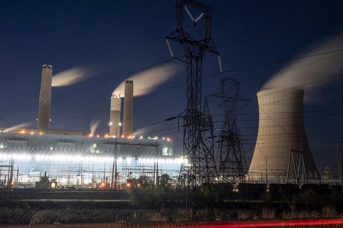 Steam rises from the Miller coal power plant in Adamsville, Ala., in April. An industry group says a climate plan in Congress would shut down all U.S. coal plants by 2030 or earlier.