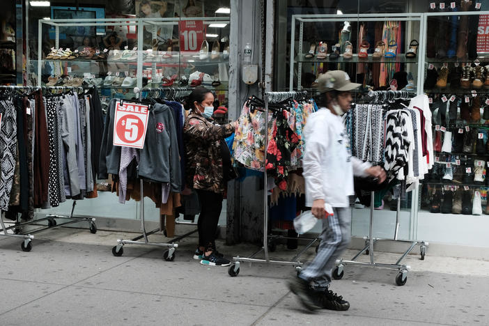 People shop in the Brooklyn borough of New York City in May. Poverty declined in 2020, according to the U.S. Census Bureau's Supplemental Poverty Measure.