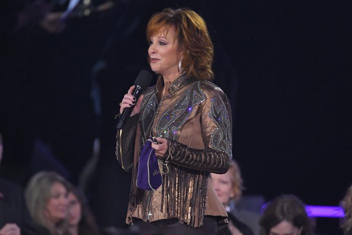 Reba McEntire appears at the Country Music Association Awards in 2019. The singer was rescued from a building in Oklahoma this week after a staircase collapsed.